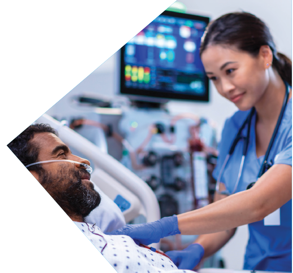 a nurse checks on her patient